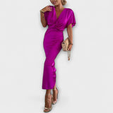 Sable ™ ｜Fast satinmaxiklänning med V-ringning och korsknut