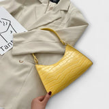 Monika. ™ ｜Lackad läderväska