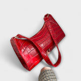 Monika. ™ ｜Lackad läderväska