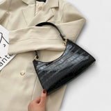 Monika. ™ ｜Lackad läderväska