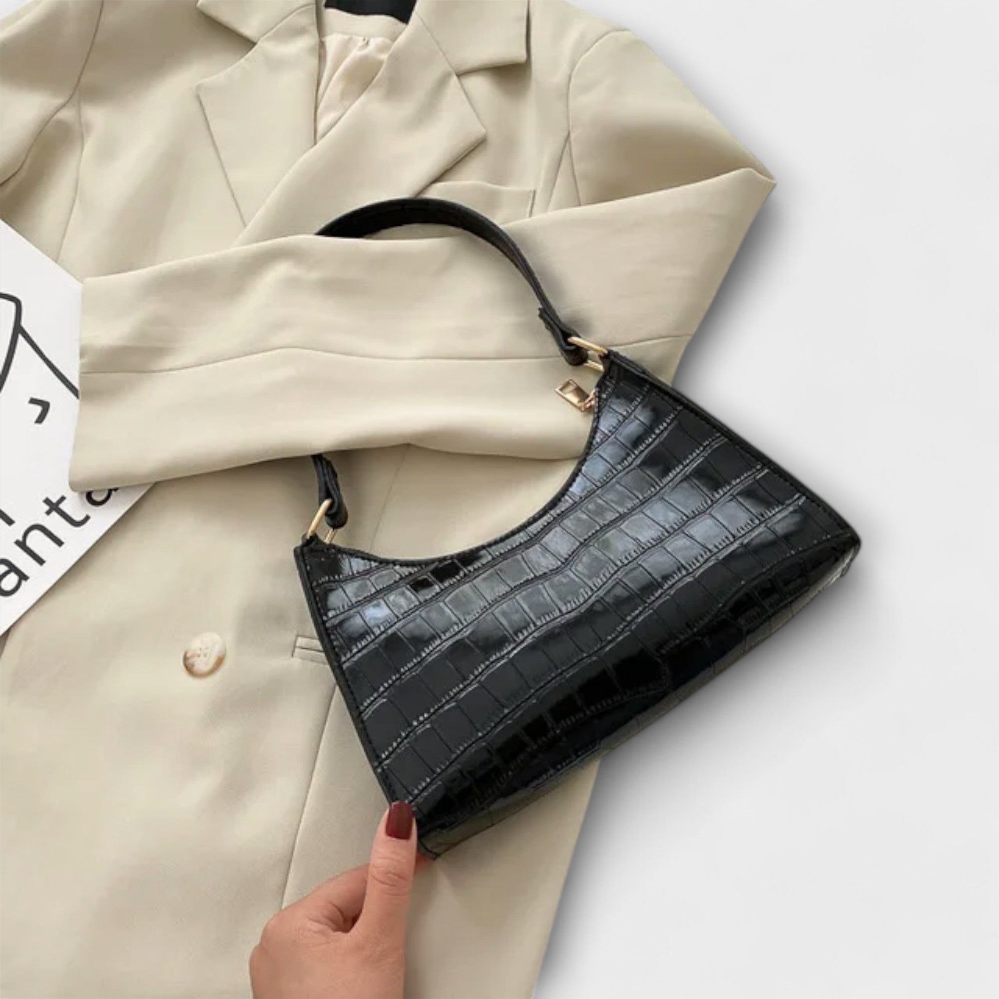 Monika. ™ ｜Lackad läderväska