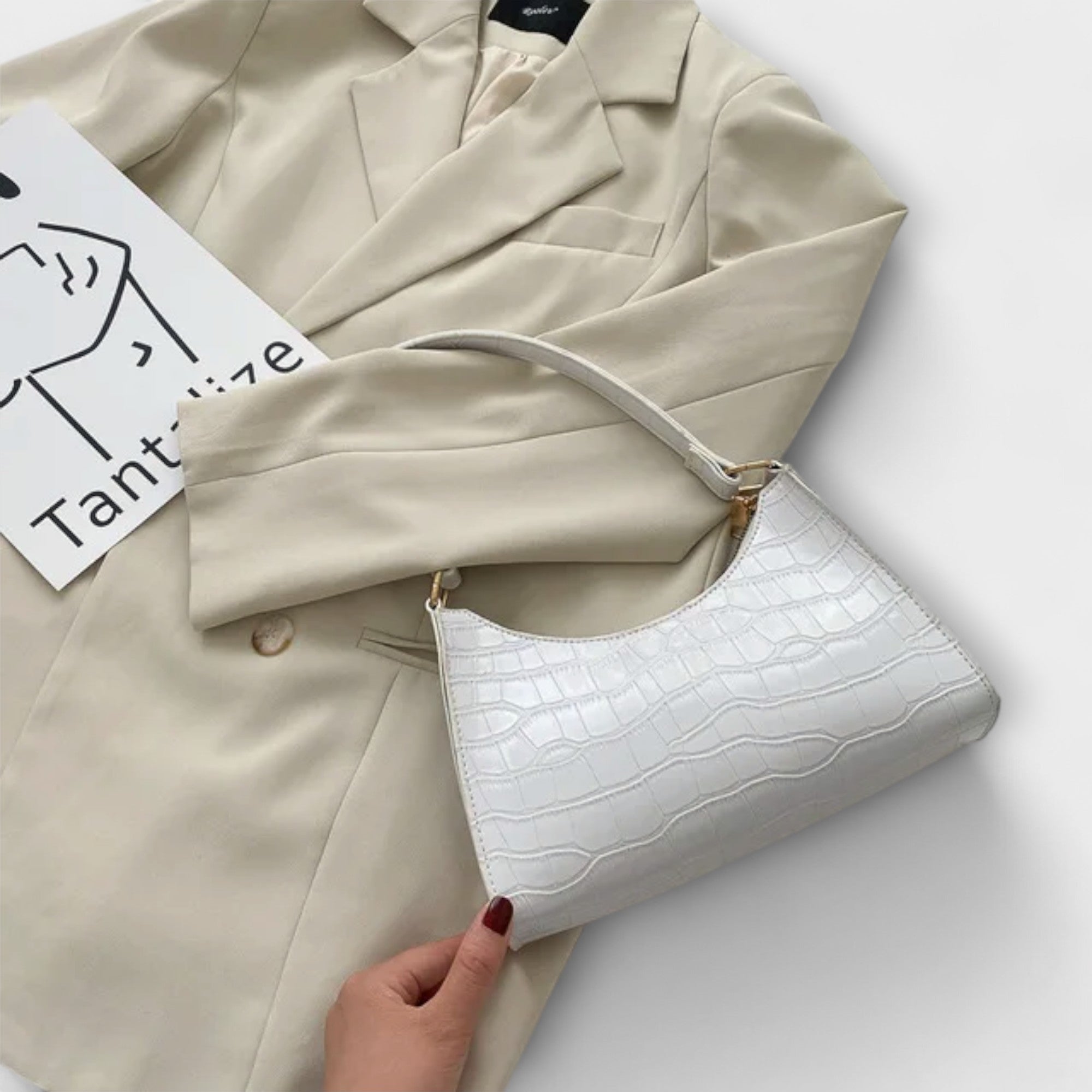 Monika. ™ ｜Lackad läderväska