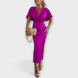 Sable ™ ｜Fast satinmaxiklänning med V-ringning och korsknut